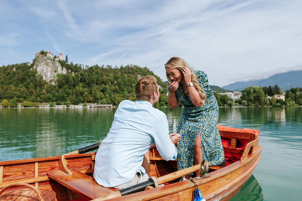 Couple embracing at Lake Bled, a romantic place to propose